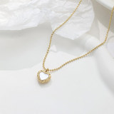 Elegante collar con colgante chapado en oro de 14 quilates con incrustaciones de acero inoxidable en forma de corazón para mujer