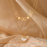 Collar con colgante chapado en oro de 18 quilates con incrustaciones de acero de titanio en forma de corazón de viaje de estilo simple