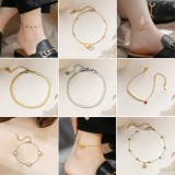 Tobillera de acero de titanio de oro de 18K para mujer, dise?o de nicho de lujo, no se decolora, joyería de pie de alta gama, novedad de 2026.
