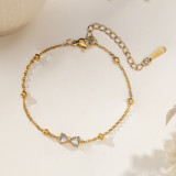 Tobillera de acero de titanio de oro de 18K para mujer, dise?o de nicho de lujo, no se decolora, joyería de pie de alta gama, novedad de 2026.