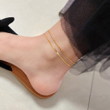 Tobillera de acero de titanio de oro de 18K para mujer, dise?o de nicho de lujo, no se decolora, joyería de pie de alta gama, novedad de 2026.