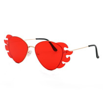 The new flame sunglasses burst personality frameless metal sunglasses western dance weird glasses wholesale sunglasses