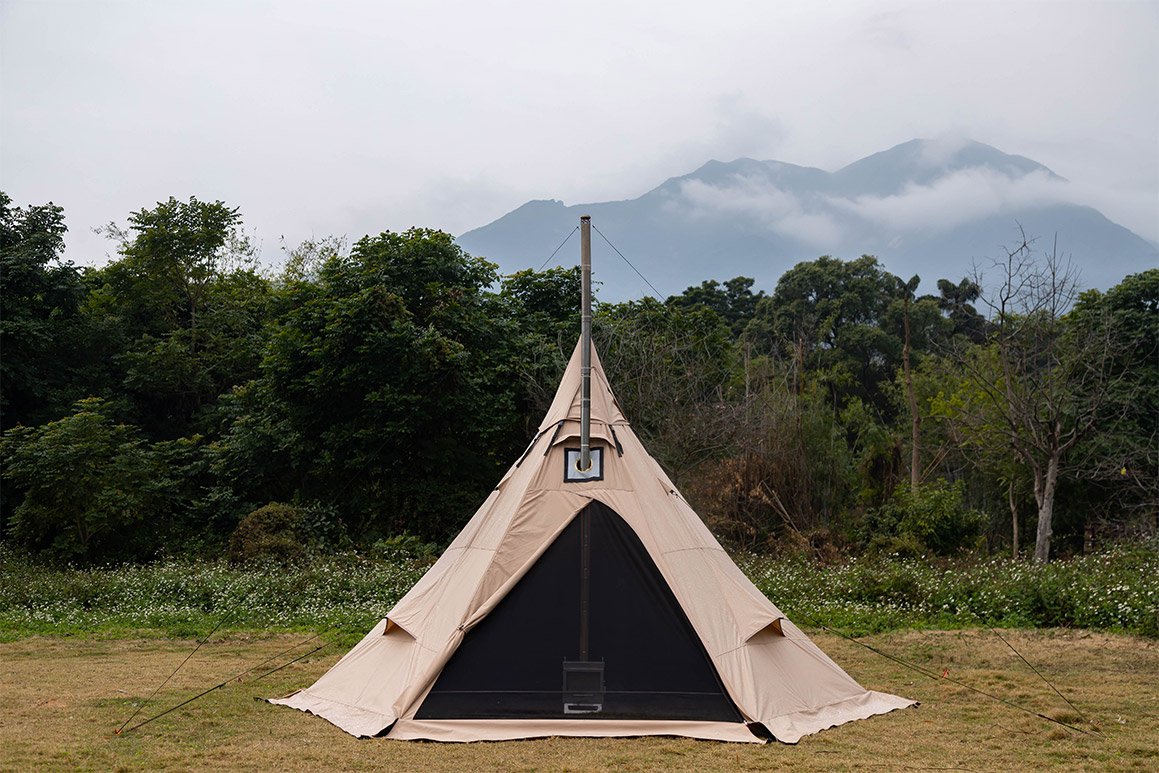 PEAK teepee tent with wood stove in the forests