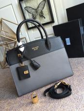 1BA047 prada female mixed-material color-contrast business briefcase laptop bag embellished with charming padlock pendant at top handle antique bronze hardware 