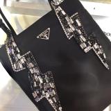 Prada ladies degradable nylon plain portable tote shoping bag with diamond-decorated lightning-shape pendant at top handle 