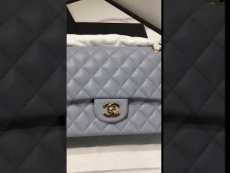 Chanel  CF 25 A01112 female quilted classic flap crossbody bag  with iconic Double-C twist fastener  medium size