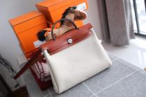 Hermes herbag 31 canvas  waterproof handbag contrast-color holiday traveling bag amply internal space for daily essentials 