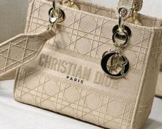 Dior sleek medium lady D-Lite handbag elegant canvas lightweight shopping tote bag with symbolic decorative Dior charm and reversible and detached wide shoulder strap 