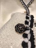 Chanel female luxury ready to wear couture socialite cropped jacket warm autumn coat with braided trim and embroidered camellia pattern on side pock