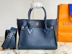 Louis Vuitton LV on my side shopper handbag plain shopping tote with braided trim and studded feet