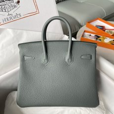 Togo Hermes Birkin 25 top-handle handbag tote with protective feet and strap closure semi handmade sewing