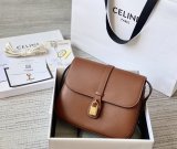 Celine medium cabou sling crossbody shoulder flap messenger bag structured boxy clutch with padlock adornment
