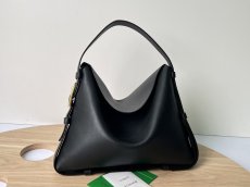 Bottega Veneta cradle underarm shoulder flap tote vintage baguette hobo bag with military-inspired triangle-buckle strap 