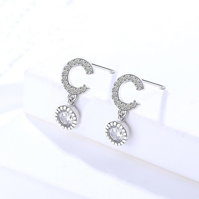Silver letter C earrings 293