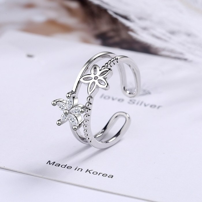 Ring Female Korean Version Small Fresh Diamond-encrusted Small Flower Double-layer Hollow Opening Hand Ornament XzJZ340