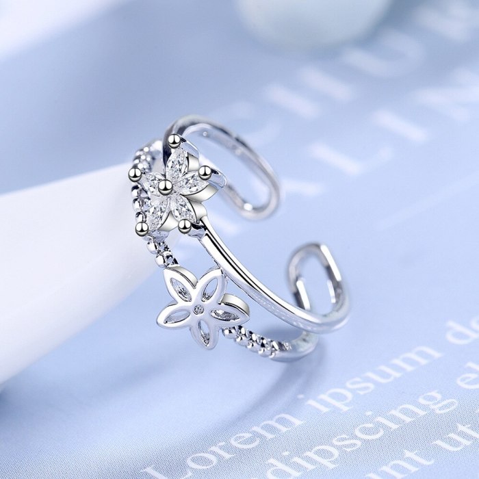 Ring Female Korean Version Small Fresh Diamond-encrusted Small Flower Double-layer Hollow Opening Hand Ornament XzJZ340
