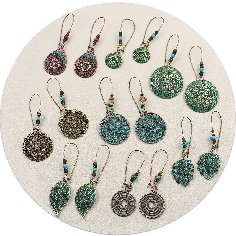 Earrings Ancient Bronze Metal Exaggerated Carved Earrings Female Bohemian Retro Element Earrings Wholesale