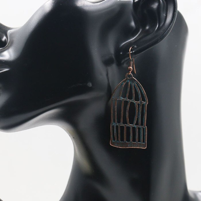 Personalized Fashion Alloy Pendant Earrings Hollow Cage Bird Asymmetric Earrings Female Creative Ornament
