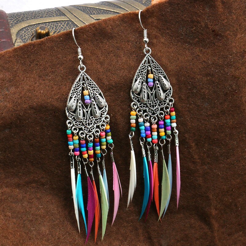 New round Hollow Exquisite Earrings Bohemian Fashion Feather Tassel Earrings Exotic Ornament Wholesale