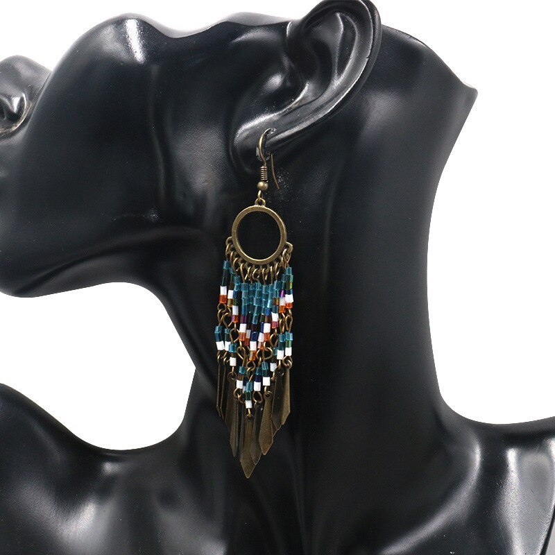 European and American Stylish round Cutout Earrings Female Creative Bead Tassel Earrings Bohemian Fashion Ornament