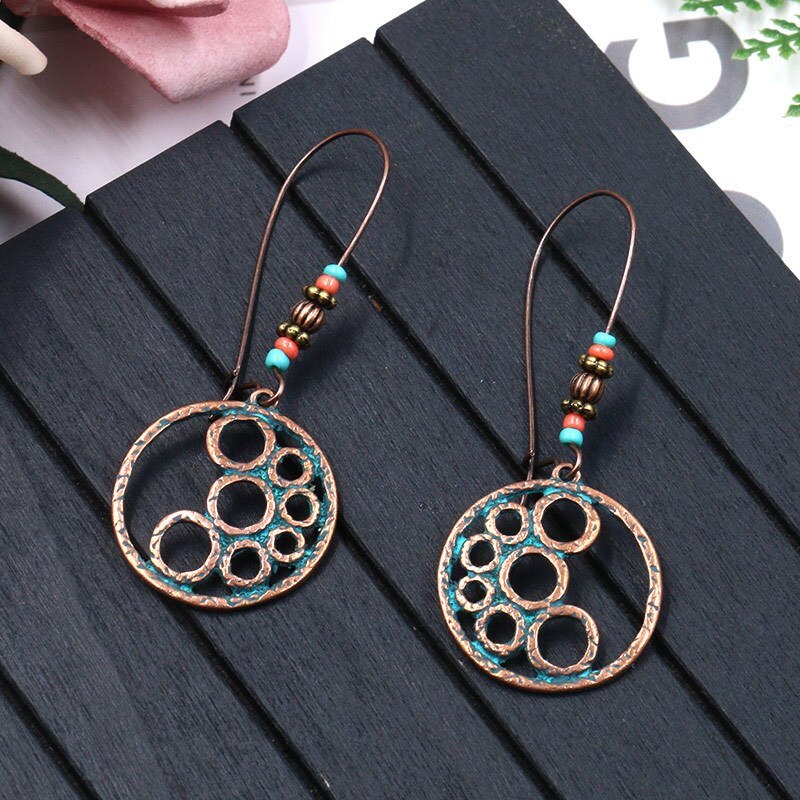 Korean Style Palace Style Hollow Carved Earrings Female Fashion Personality Alloy Eardrops Earrings Bohemian Hot Sale