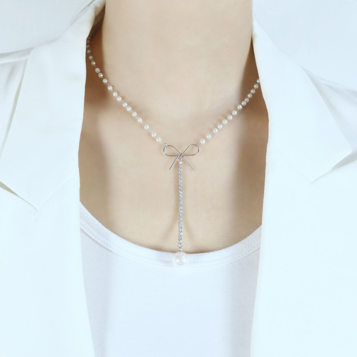 New Arrival Fashion Women Chokers Necklaces Trendy Simulated Pearl Luxury Bow Long Pearl Tassel Pendant Necklace