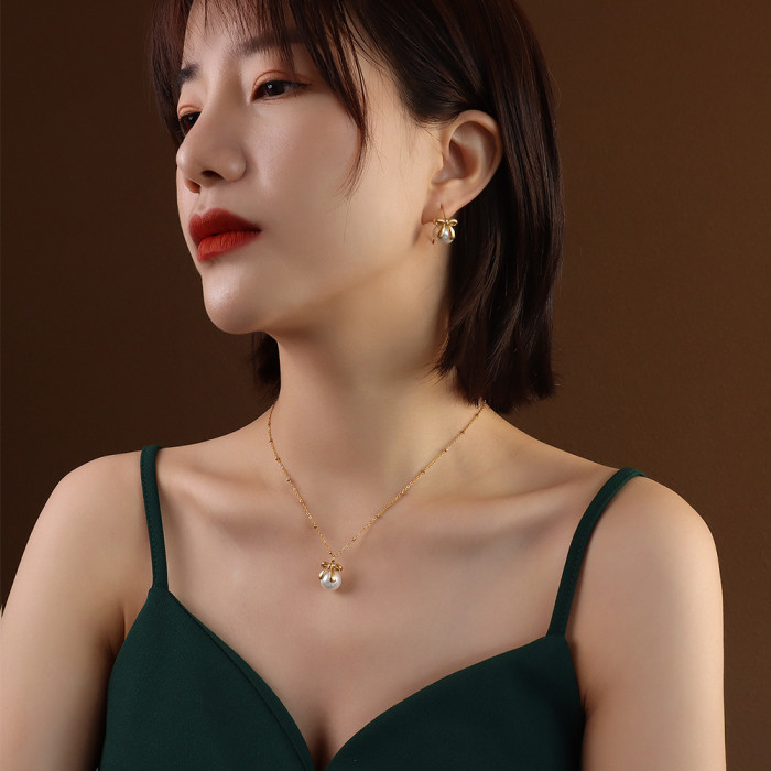 Korean High end Fashion Charm Harmonie Imitation Pearl Bow Earrings Female Jewelry Wholesale Earing