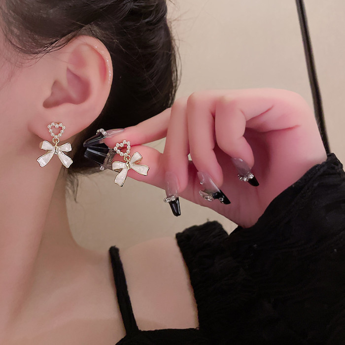 2022 New Simple Enamel White Bow Ear Clip on Earrings Female Fashion Sweet Pearl Heart Without Piercing for Women