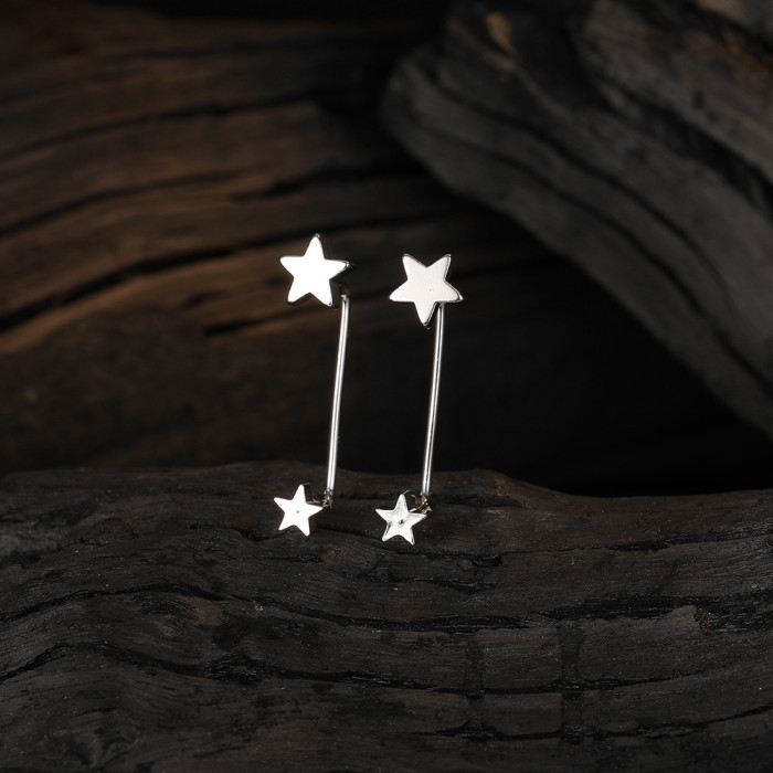 Screw the thread and hang the star earrings. Geometric five point star earrings. Jewelry earrings