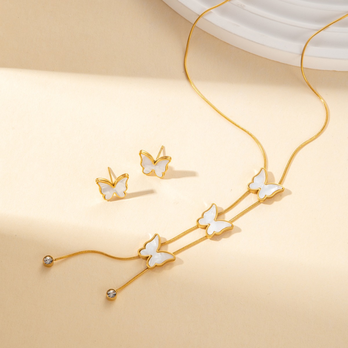 2024 New Light Luxury Bone Sense Titanium Steel Shell Frosted Butterfly Heart Fringe Necklace Earrings Set 216045105210