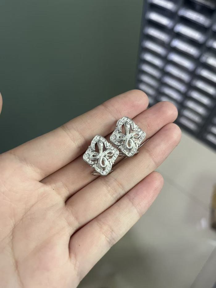 Four-leaf Clover and Snake-shaped Stud Earrings with Diamonds for Women,  Design in the Buche Style, Light Luxury and Fashionable Earrings