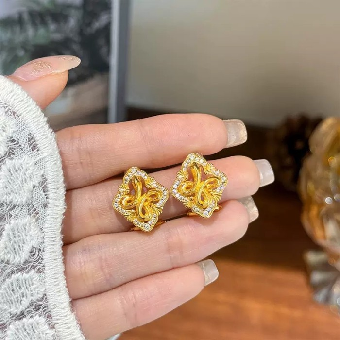 Four-leaf Clover and Snake-shaped Stud Earrings with Diamonds for Women,  Design in the Buche Style, Light Luxury and Fashionable Earrings
