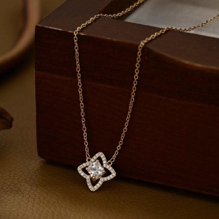 Wholesale of Gold - Plated Micro - Inlaid Cubic Zirconia Collarbone Necklaces for Women with a Small - Group Design Sense, Hollowed - out Lucky Four - Leaf Clover Necklaces