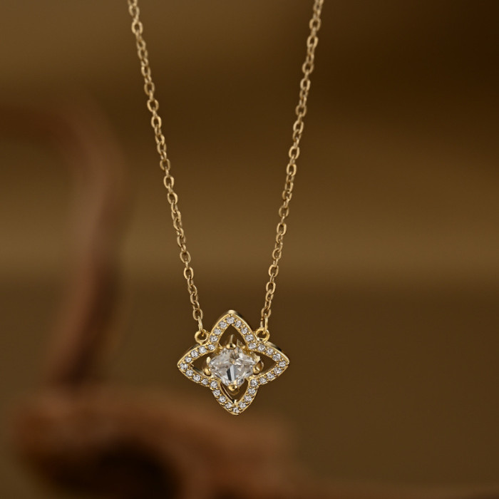 Wholesale of Gold - Plated Micro - Inlaid Cubic Zirconia Collarbone Necklaces for Women with a Small - Group Design Sense, Hollowed - out Lucky Four - Leaf Clover Necklaces