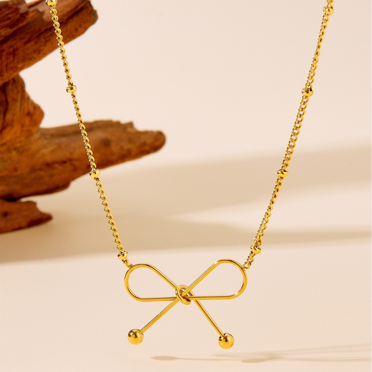 Cross-Border Women's Titanium Steel Non-Fading Bowknot Gold New High-End Jewelry Wholesale Bracelet Necklace Set