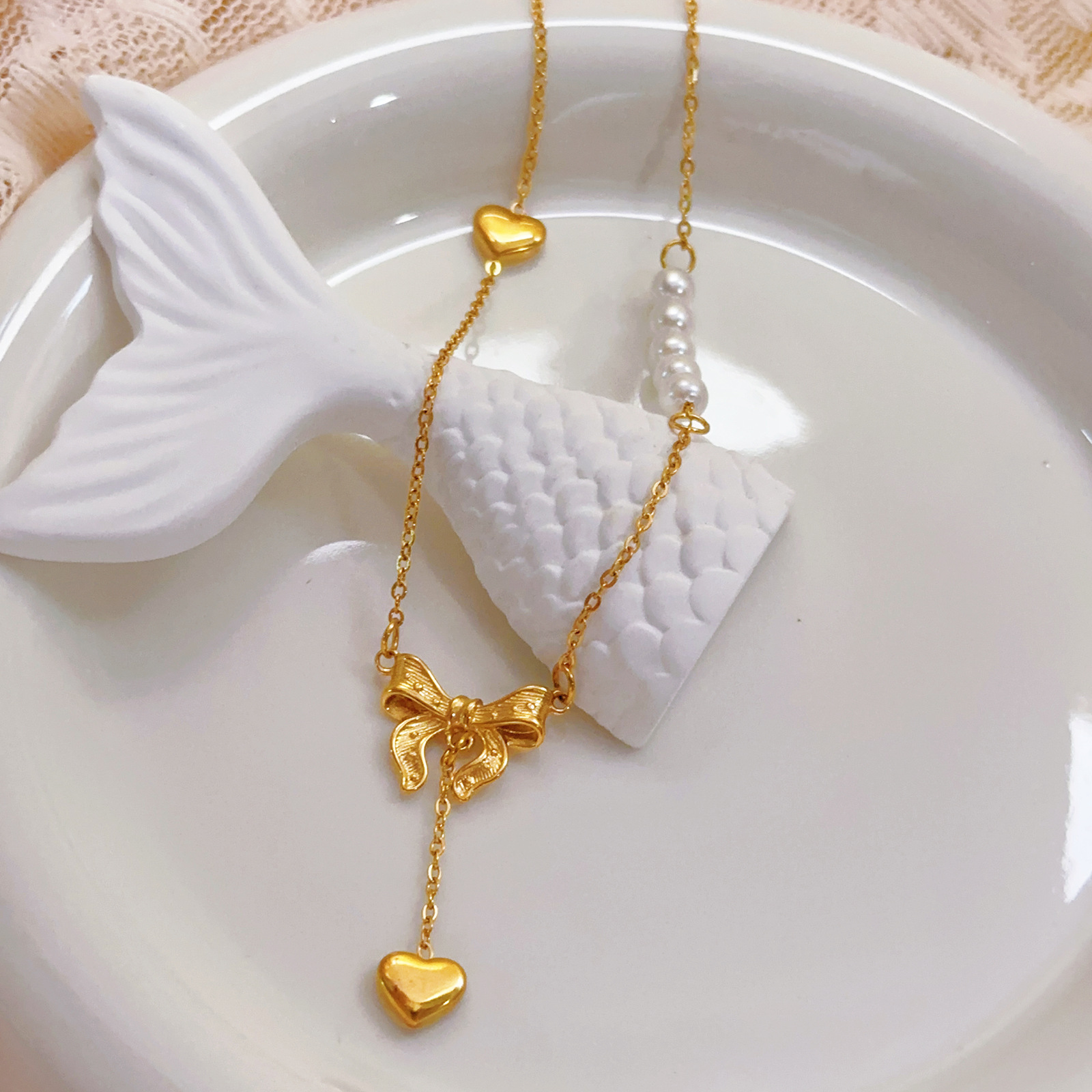 Cross-Border Pearl Heart Bow Tassel Necklace for Women Gold Light Luxury Butterfly Pearl Titanium Steel Fashion Jewelry Wholesale