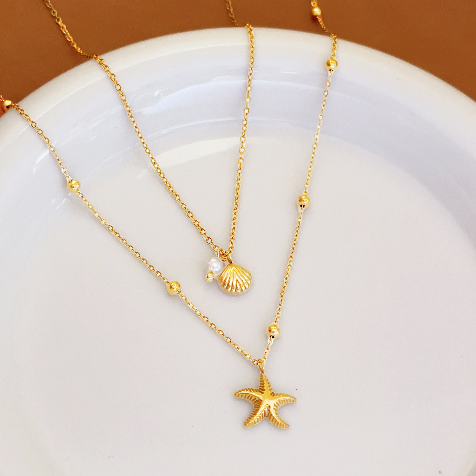 2025 New European and American Style Stainless Steel Ocean Wind Shell Starfish Pearl Necklace Fashion Personality Pendant Light Luxury