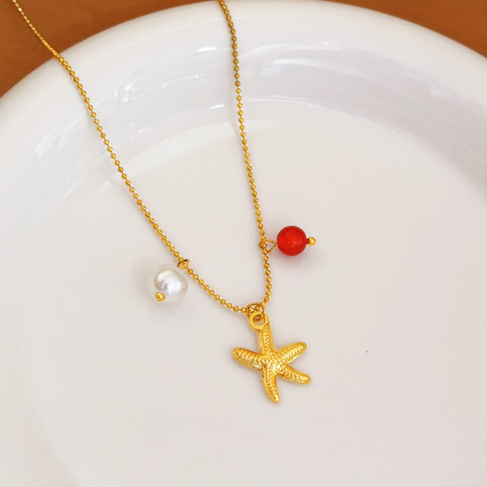 Amazon New Bohemian Style Pearl Necklace Starfish Pendant Choker for Women Fashion Commuting Design Jewelry