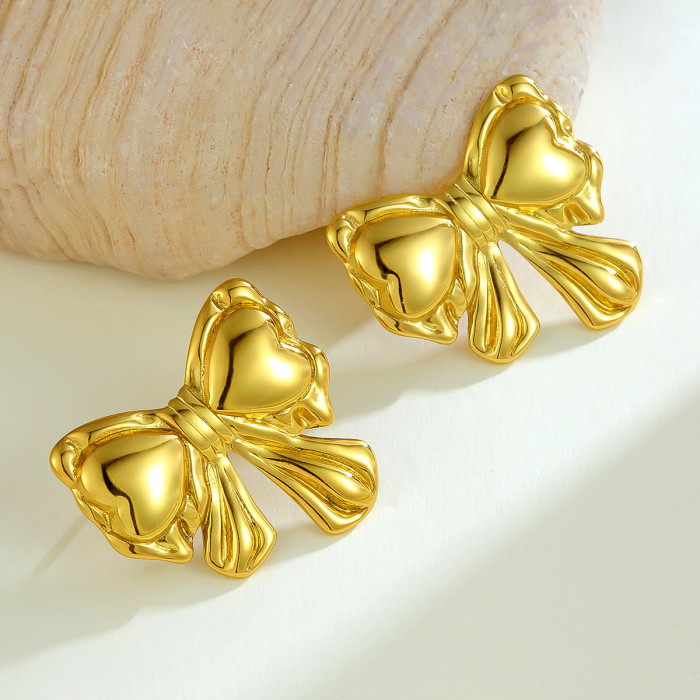 European and American Cross-Border New Titanium Steel Gold-Plated Trendy Fashion Metal Style Bowknot Earrings for Women with Unique Niche Design Sense