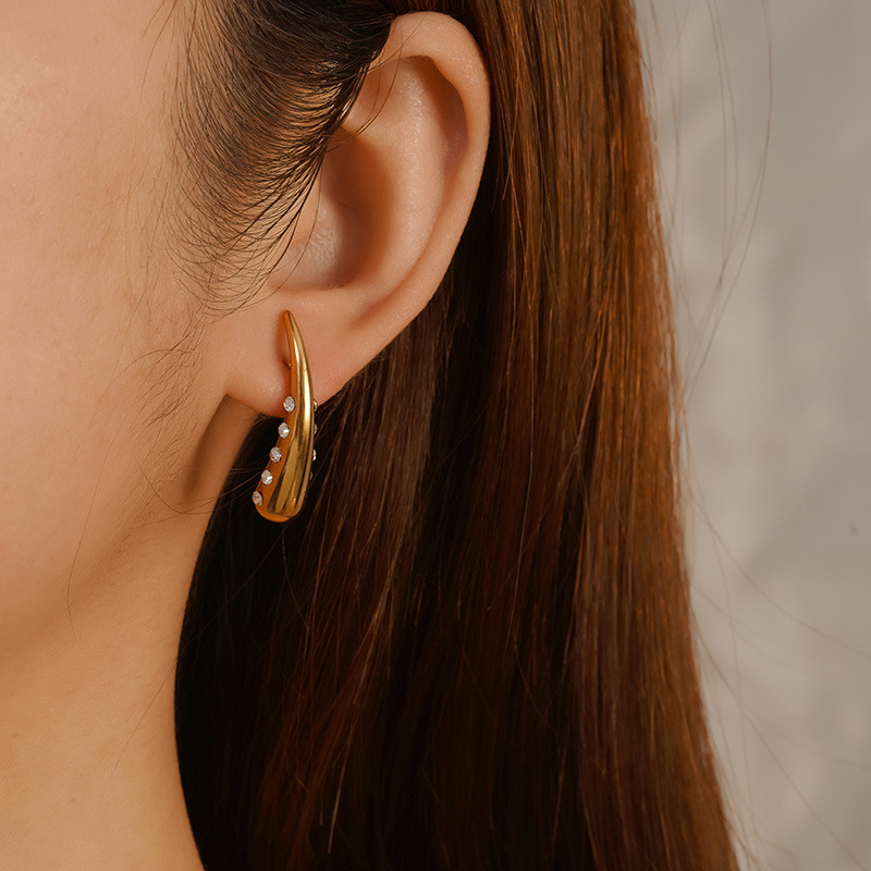 European and American Cross-Border Stainless Steel 18K Gold Water Drop Earrings Simple Smooth Hollow Flowing Water Long Stud Earrings Amazon Jewelry