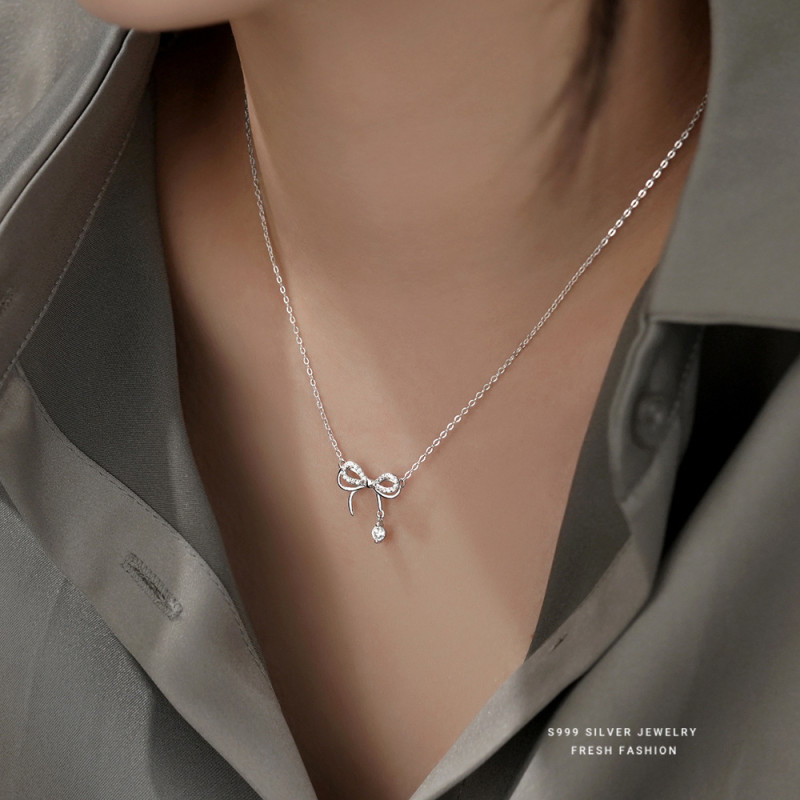 S999 Pure Silver Dynamic Bow Necklace for Women Versatile Light Luxury Niche Pendant Butterfly Dream Collarbone Chain Gift Wholesale