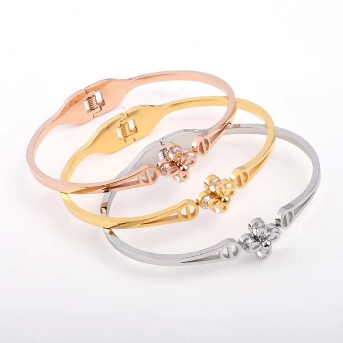Japanese and Korean Fashion Hollow Clip Stone Lucky Four-Leaf Flower Bracelet Personality Open Spring Design Stainl...