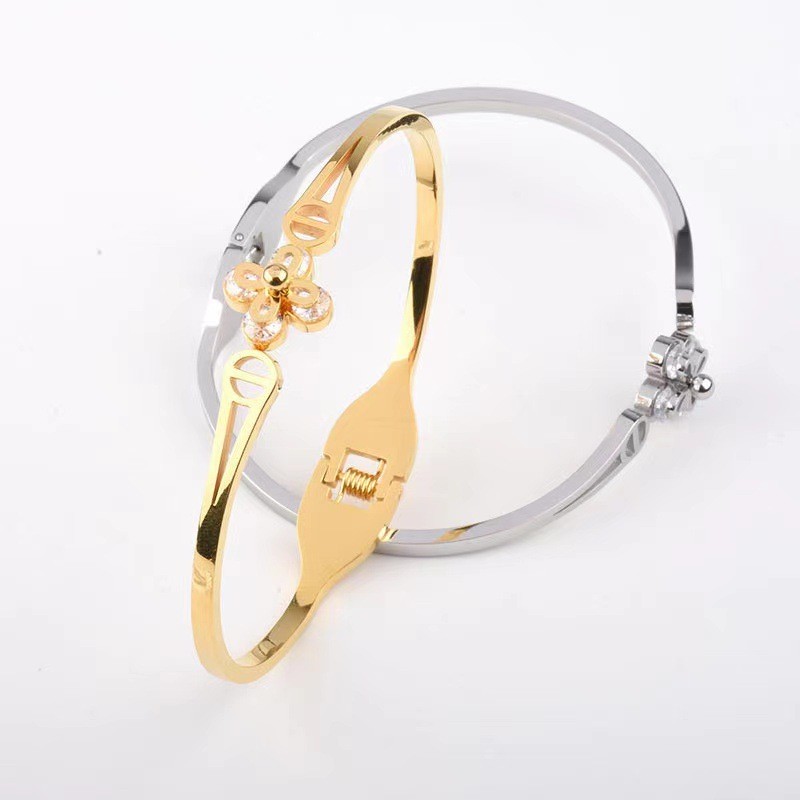 Japanese and Korean Fashion Hollow Clip Diamond Lucky Four-Leaf Flower Bracelet Personality Open Spring Design Stainless Steel Women's Bracelet