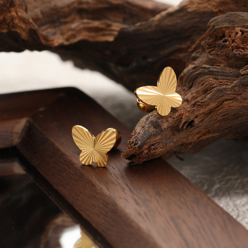 Cross-Border New Handmade Embossed Women's Titanium Steel INS Butterfly Ear Bone Stud Laser Surface Fashion Simple Personality Earrings