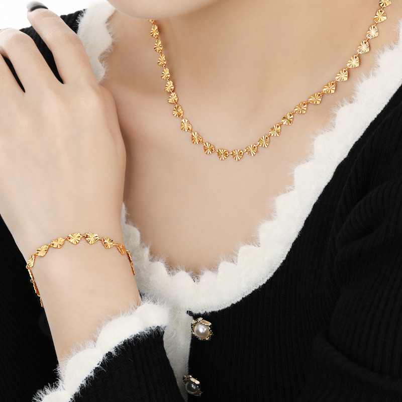 European and American Cross-Border Hot Sale Fashion Personality Heart Embossed Sunflower Rice-shaped Titanium Steel Necklace Bracelet Women's Jewelry Set
