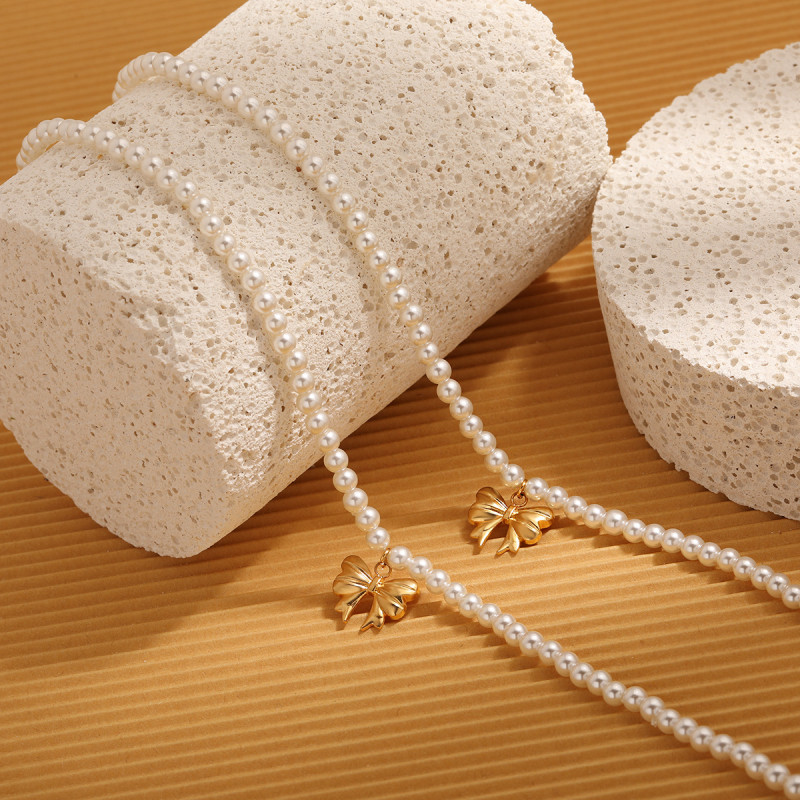 High-End Sense Shijia Pearl Splicing Bowknot Titanium Steel Necklace Plated 18K Gold Niche Ins Style Stainless Steel Collarbone Chain