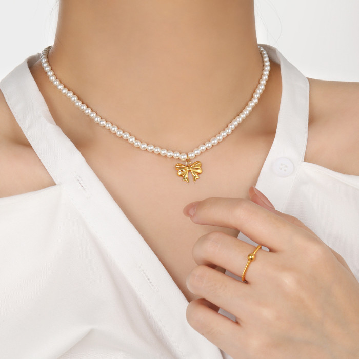 High-End Sense Shijia Pearl Splicing Bowknot Titanium Steel Necklace Plated 18K Gold Niche Ins Style Stainless Steel Collarbone Chain