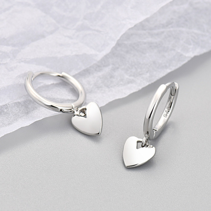 Cross-Border European and American Hot-Selling Smooth Peach Heart Earrings for Women Simple Daily Fashionable Elegant Heart-Shaped Earrings Niche Ear Hoops