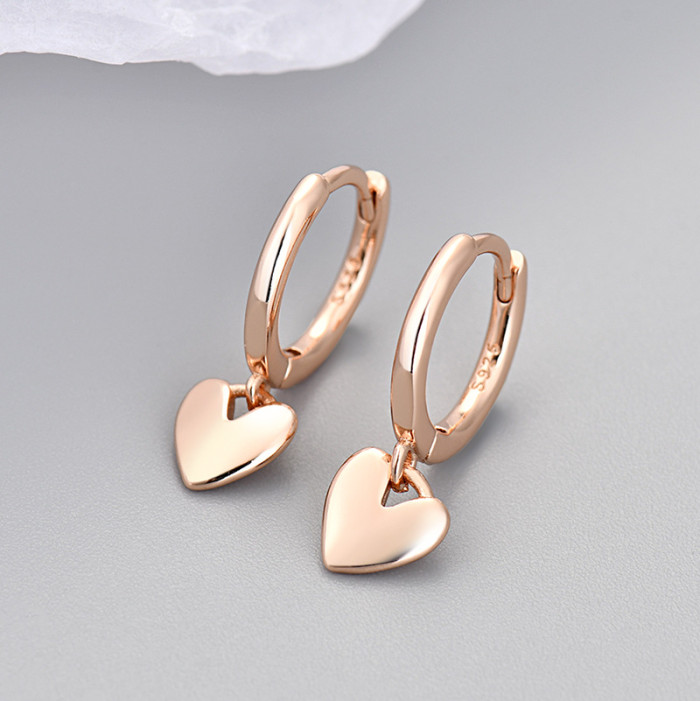 Cross-Border European and American Hot-Selling Smooth Peach Heart Earrings for Women Simple Daily Fashionable Elegant Heart-Shaped Earrings Niche Ear Hoops