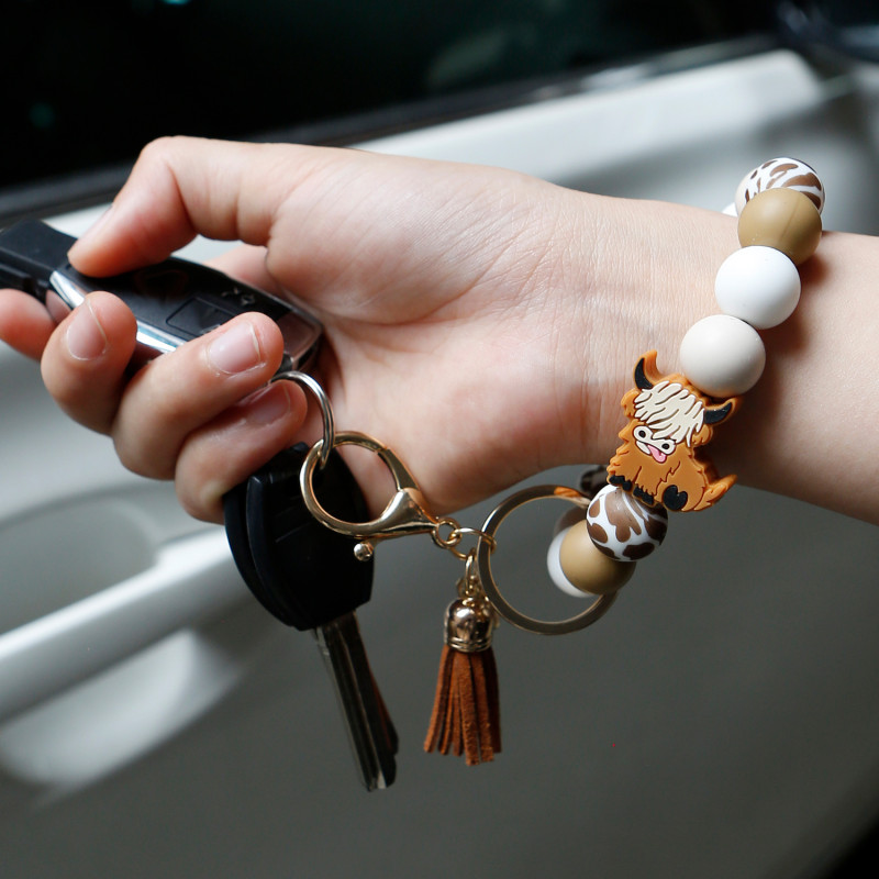 Amazon Hot-Selling Cartoon Cute Highland Cow Handmade Beaded Food-Grade Silicone Tassel Wrist Keychain